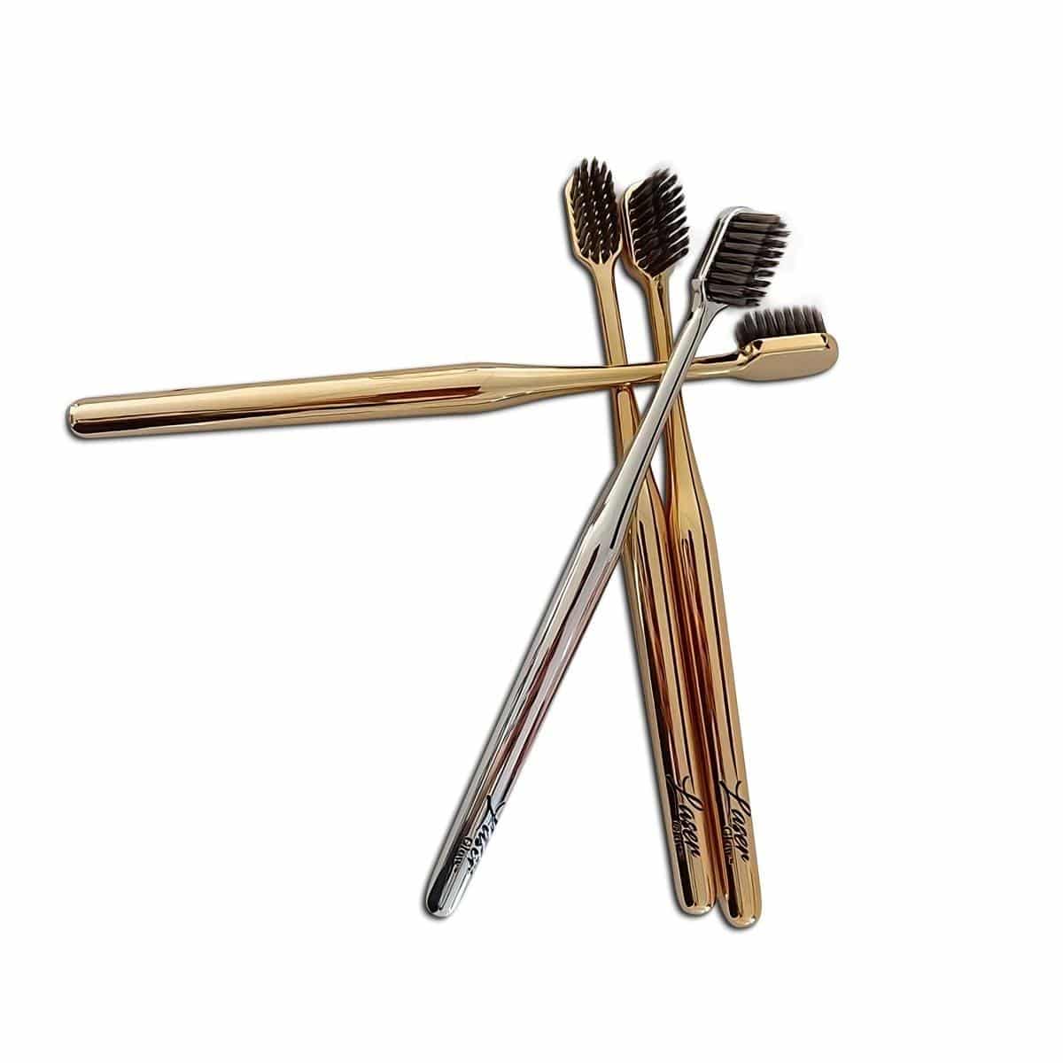 Luxury gold and silver soft bristle toothbrush by LaserGlow for a stylish and thorough clean.